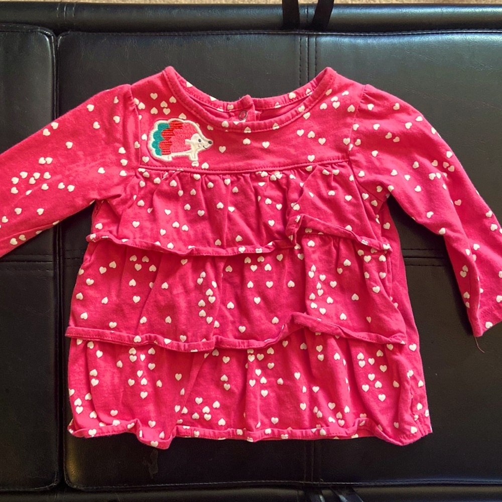 9MO pink flowy shirt with ruffles and heart and a little headgehog